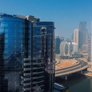 Отель Radisson Blu Hotel, Canal View, Дубай